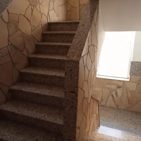 Playa Chica, Pozos Affittacamere *